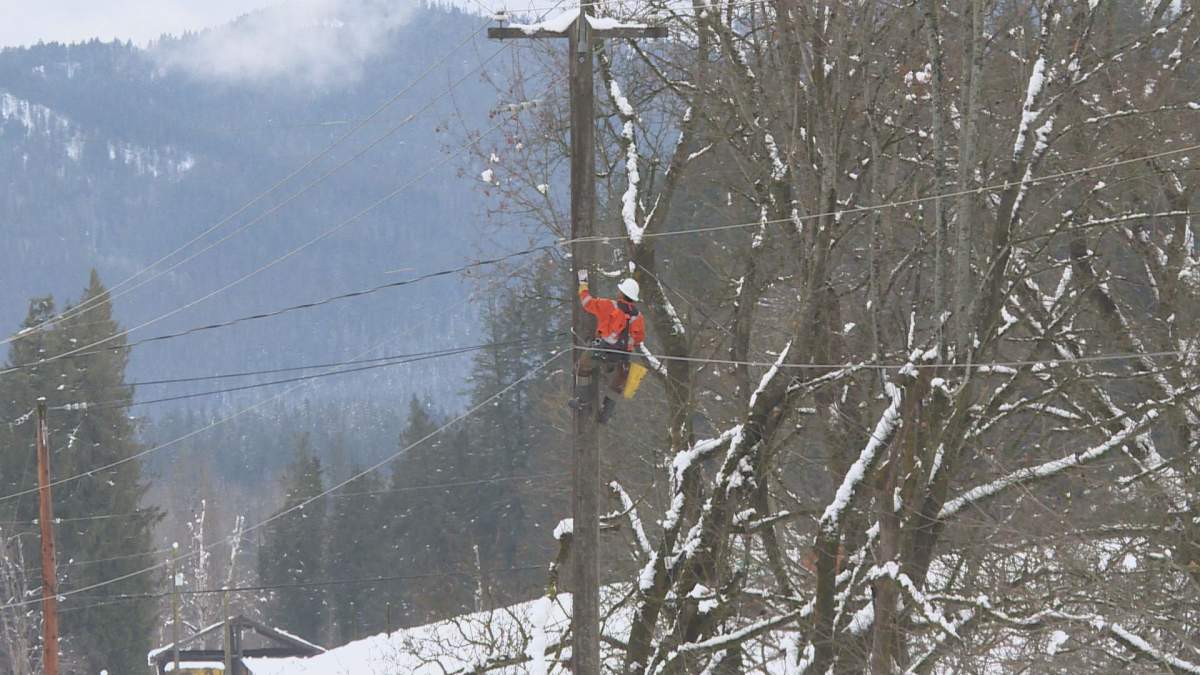 A BC Hydro crew member works on a power pole on Thursday, Jan. 2, 2020 near Salmon Arm. 