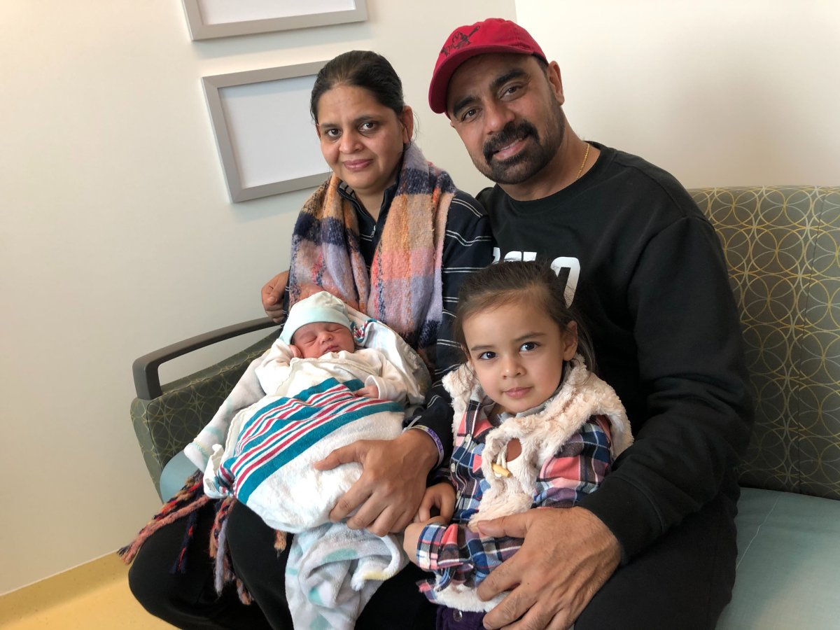 The Singhs with their newest baby — 2020's first in Winnipeg.