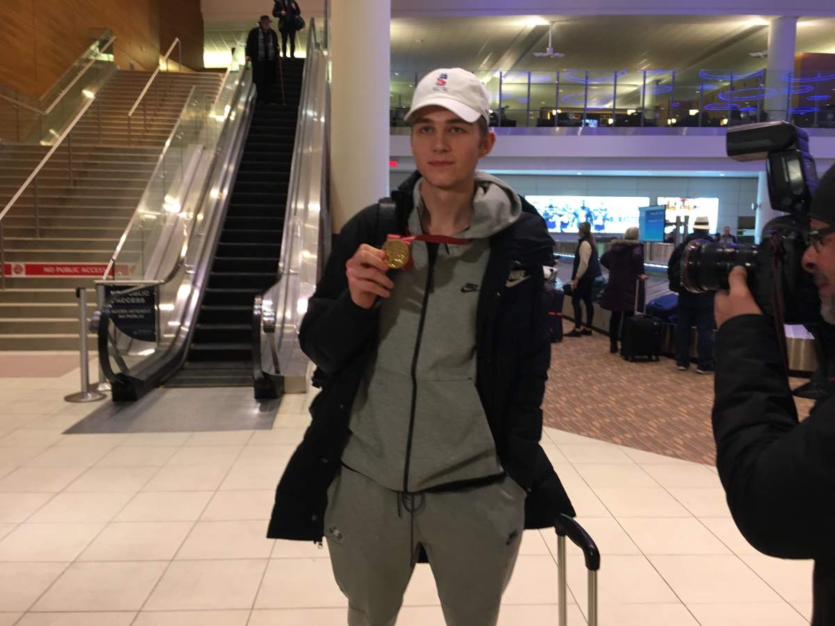 Joel Hofer arrives in Winnipeg with his world junior gold medal.