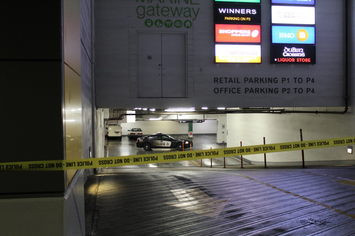 Vancouver police at the scene of a homicide discovered in the parkade of a complex on Marine Drive on Jan. 19, 2020.