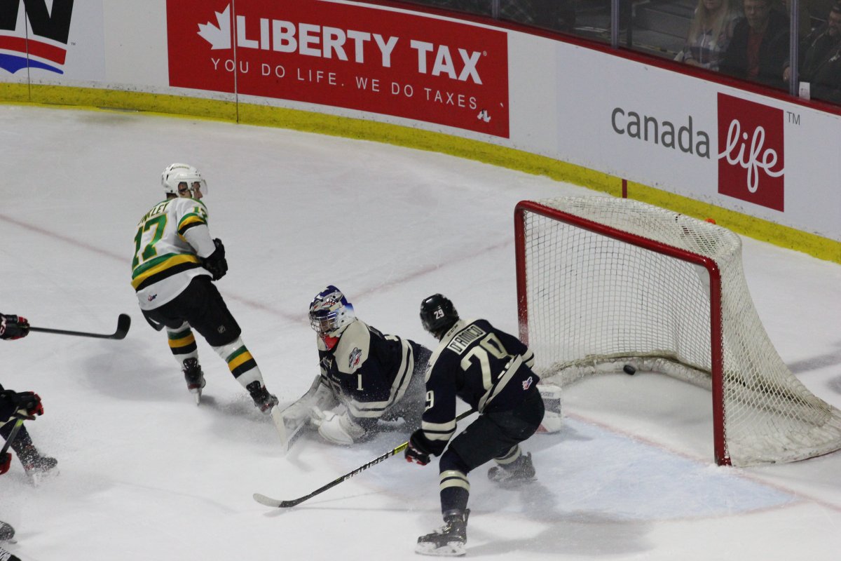 Windsor, Ont. - Nathan Dunkley of the London Knights watches as his shot slides into the back of the Spitfires net in a 6-2 London victory on January 23, 2020.