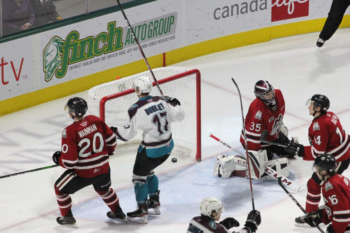Nathan Dunkley (17) of the London Knights celebrates Markus Phillips' second period goal in a 4-2 win over the Guelph Storm in London, Ont., on Jan. 26, 2020.
