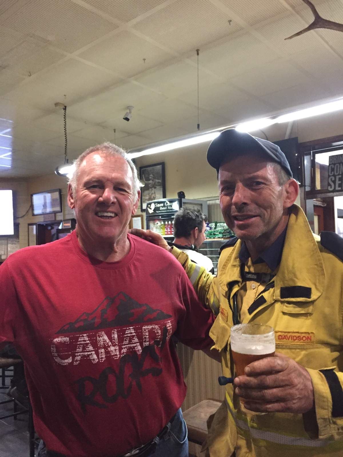 Image of Dan Derouin with former Australian Prime Minister Tony Abott.