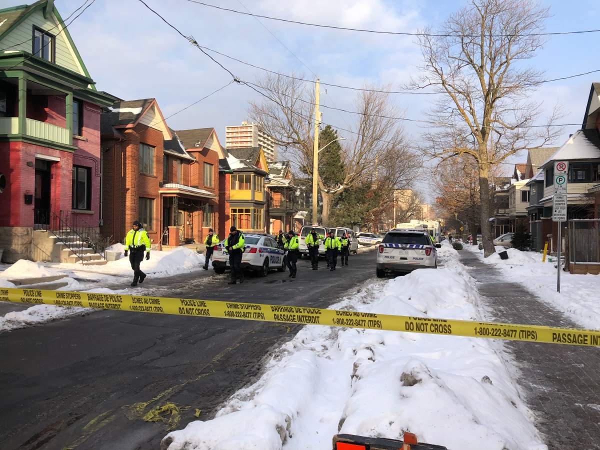 A section of Gilmour Street in Ottawa remains taped off on Wednesday afternoon as police continue to investigate a shooting that left one person dead and three others seriously injured earlier in the day.