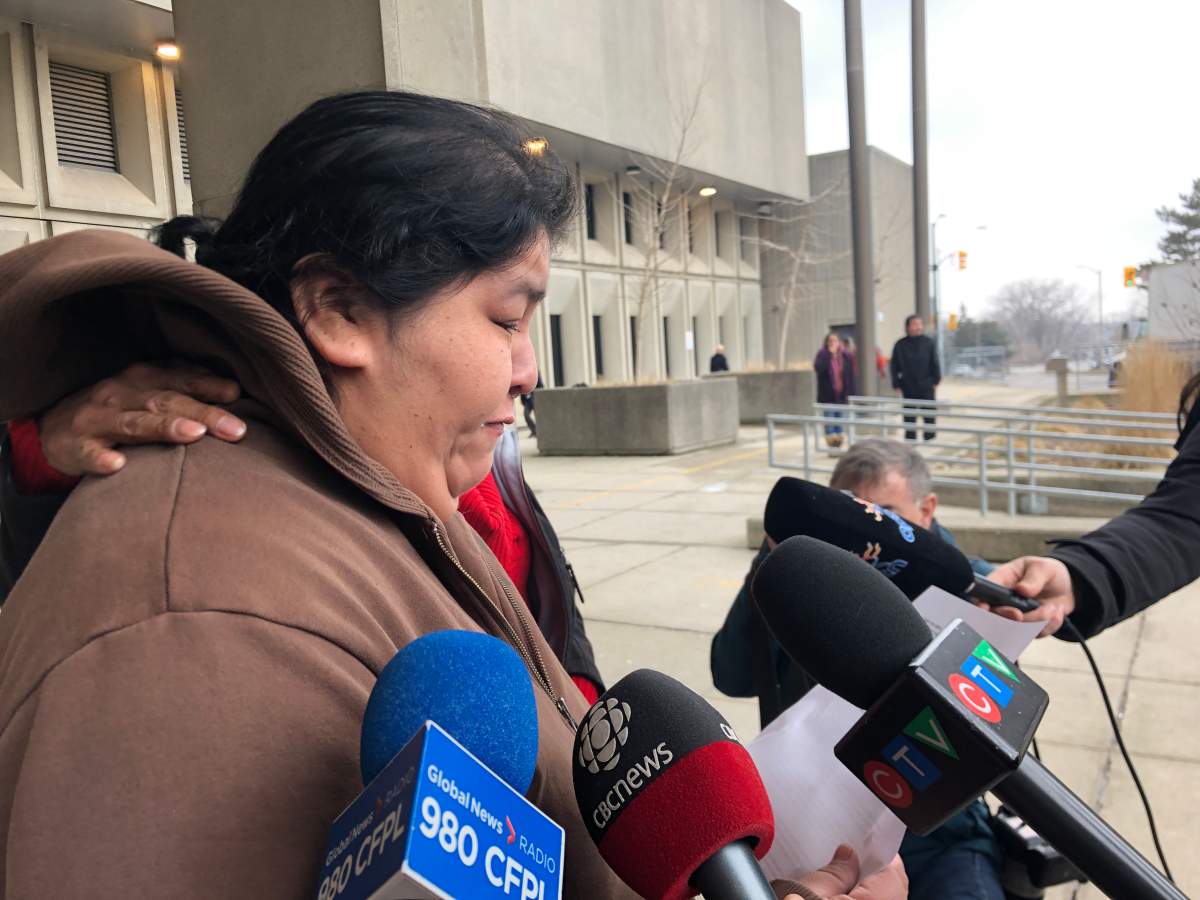 Cindy Chrisjohn reading a victim impact statement to reporters following the sentencing hearing for Nicholas Doering.