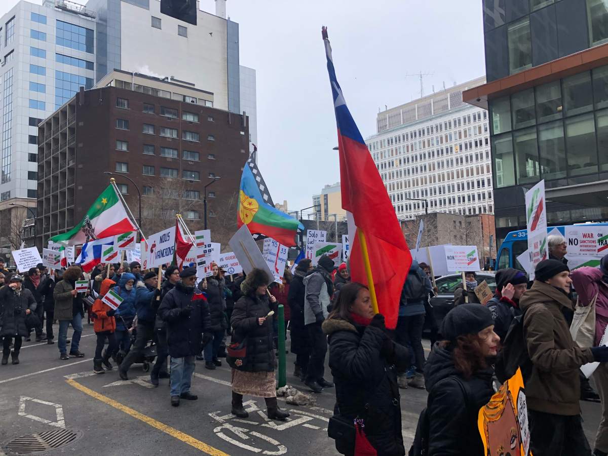 Anti-war protesters marching in downtown Montreal.