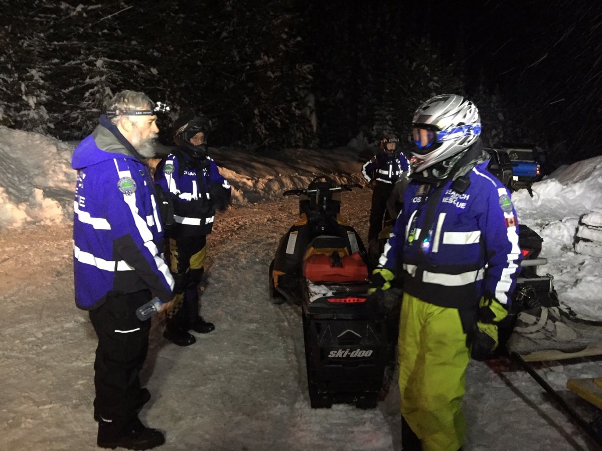 Central Okanagan Search and Rescue crews rushed to help a snowmobiler who cracked his helmet when he crashed into a tree on Tuesday night.