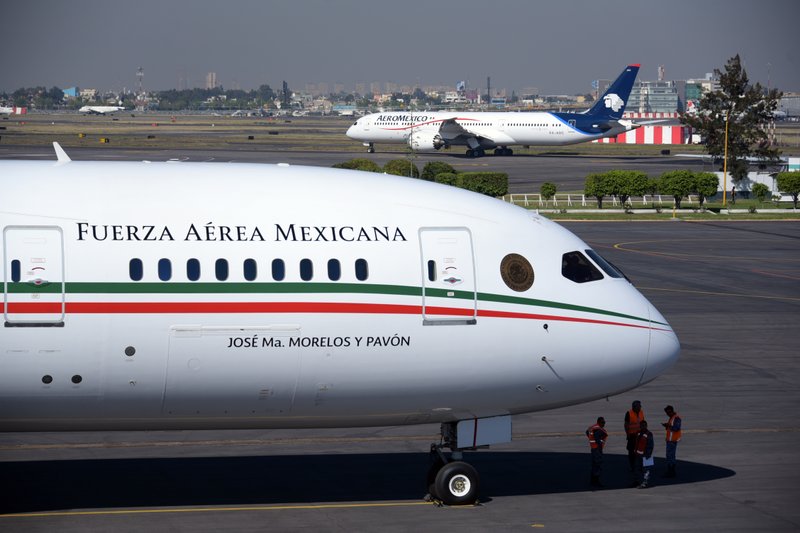 This Dec. 3, 2018 file photo provided by the Mexican Presidential press office shows the presidential airplane at the presidential hangar at Benito Juarez International Airport in Mexico City.  