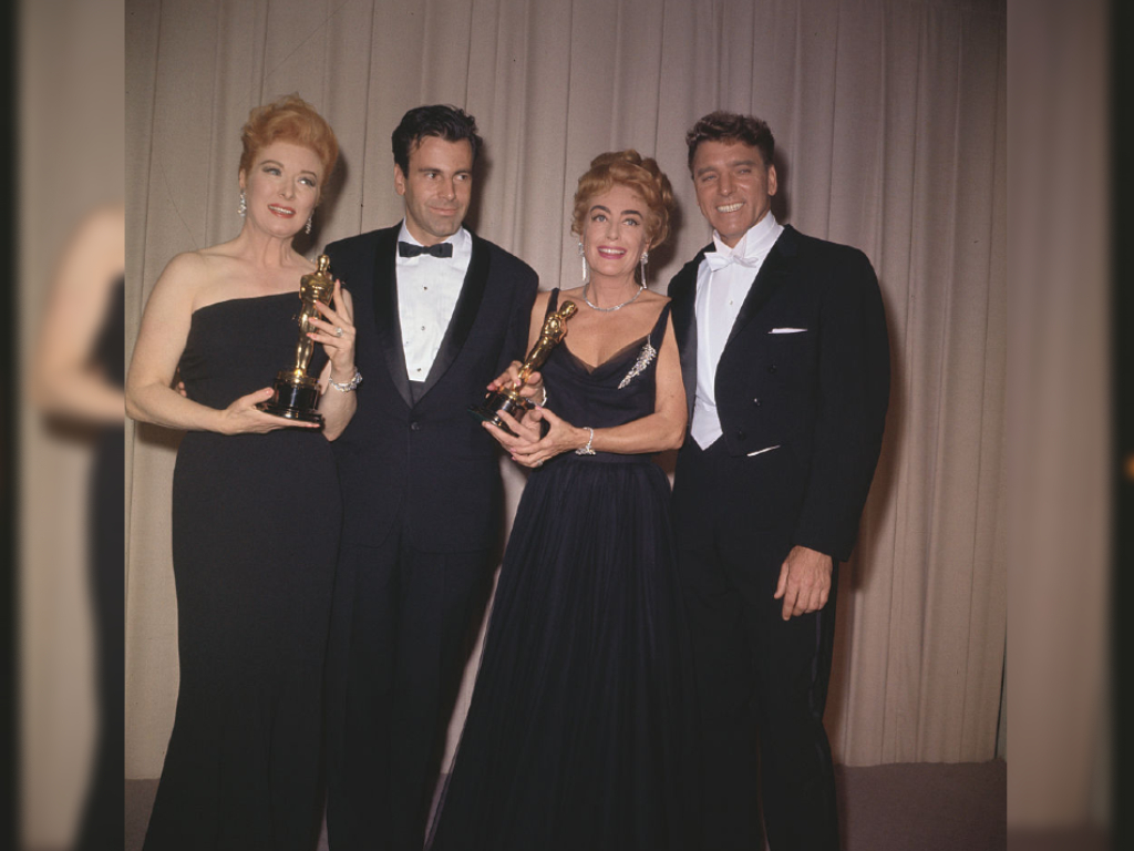 Greer Garson, Maximilian Schell, Joan Crawford and Burt Lancaster pose with their Oscars at the Academy Awards in 1963.