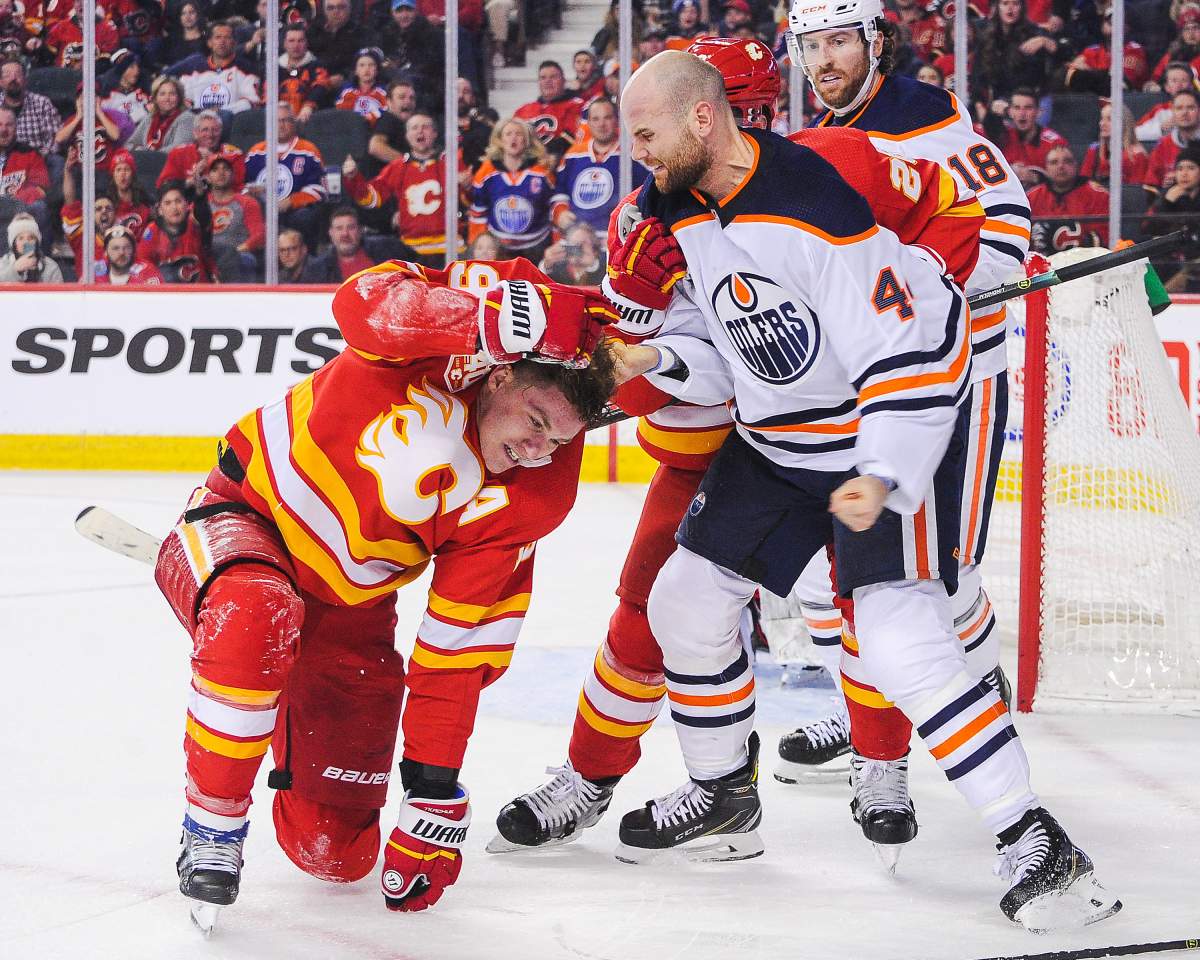 Zack Kassian of the Edmonton Oilers fights Matthew Tkachuk of the Calgary Flames during an NHL game at Scotiabank Saddledome on Jan. 11, 2020 in Calgary.