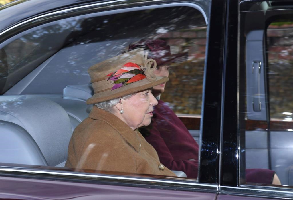 Britain's Queen Elizabeth II arrives to attend a morning church service at St. Mary Magdalene Church in Sandringham, England, Sunday Jan. 12, 2020.