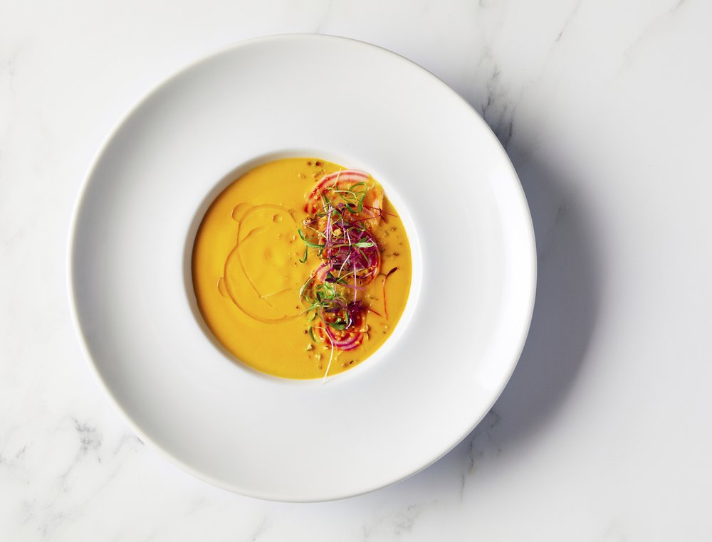 This image released by the Golden Globe Awards shows a chilled golden beet soup, prepared by Beverly Hilton Executive Chef Matthew Morgan. The dish will be served at the Golden Globe Awards on Sunday.