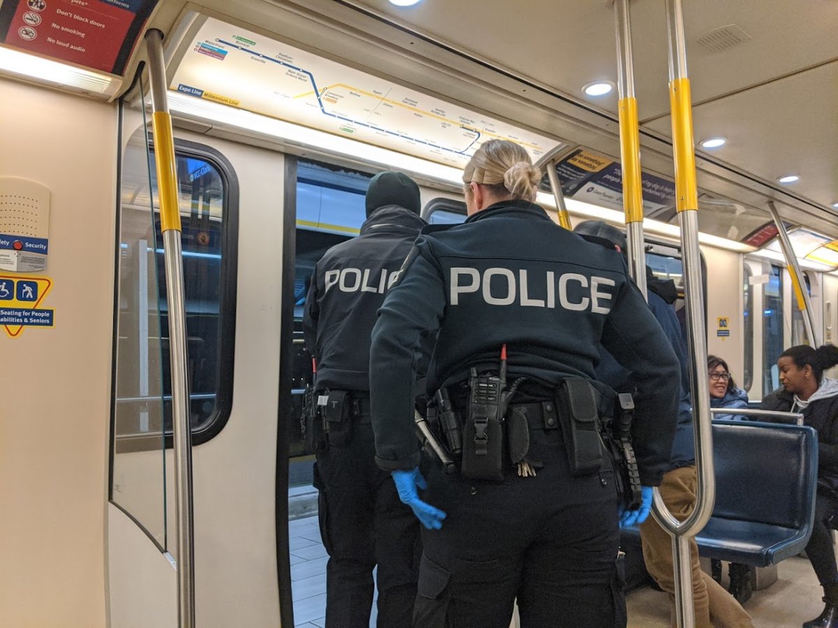 Metro Vancouver Transit Police are seen on a SkyTrain in Burnaby in this undated file photo.
