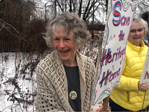 Nan Finlayson, owner of 100 Stanley Street, rallying alongside supporters.