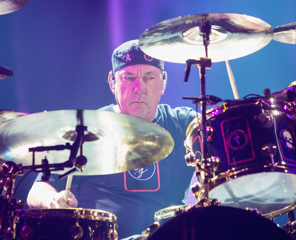 Neil Peart of Rush performs on stage during the R40 LIVE Tour at KeyArena on July 19, 2015 in Seattle, Wash.