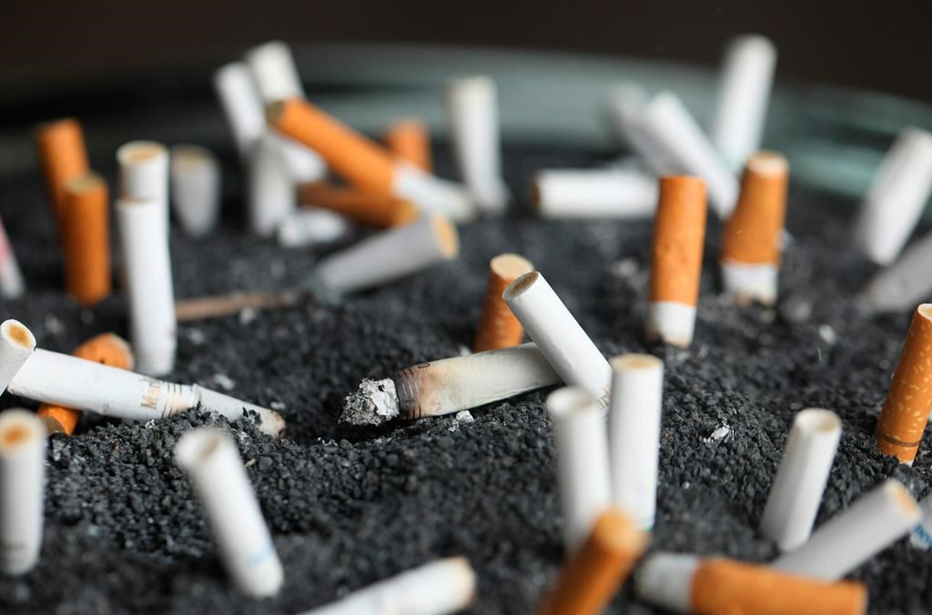 This file photo shows cigarette butts in an ashtray in New York.