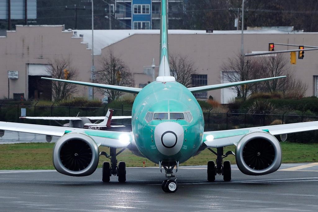 In this Dec. 11, 2019 file photo, a Boeing 737 Max airplane being built for Norwegian Air International turns as it taxis for take off for a test flight at Renton Municipal Airport in Renton, Wash.