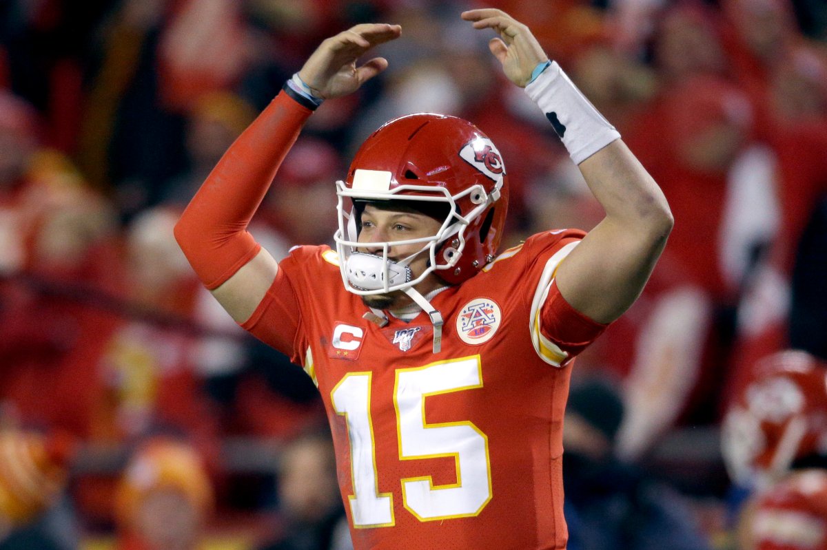 Kansas City Chiefs quarterback Patrick Mahomes celebrates in the final moments of an NFL divisional playoff football game against the Houston Texans, Sunday, Jan. 12, 2020, in Kansas City, Mo.
