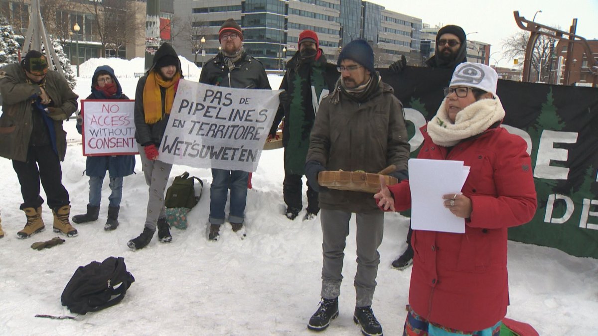 Protesters rally near Parc metro station in Montreal on Sunday, Jan. 19, 2020. 