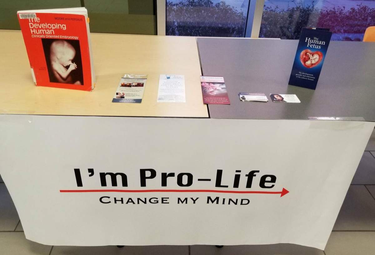 An image of an informational booth run by the UAlberta Pro-Life group. The group has won a challenge against a security fee implemented against it by the University of Alberta. 