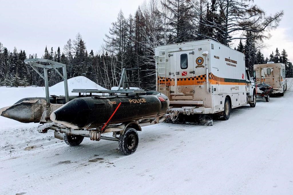 One person is dead and five tourists from France are missing after a group of snowmobilers plunged through the ice Tuesday night near Quebec's Lac Saint-Jean.