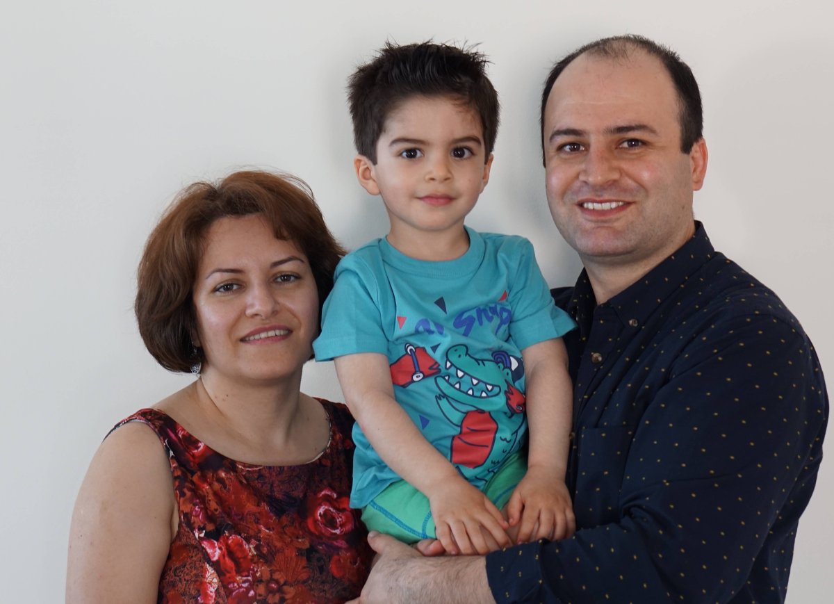 Farideh Gholami pictured with her three-year-old son Jiwan Rahimi and husband Razgar Rahimi.