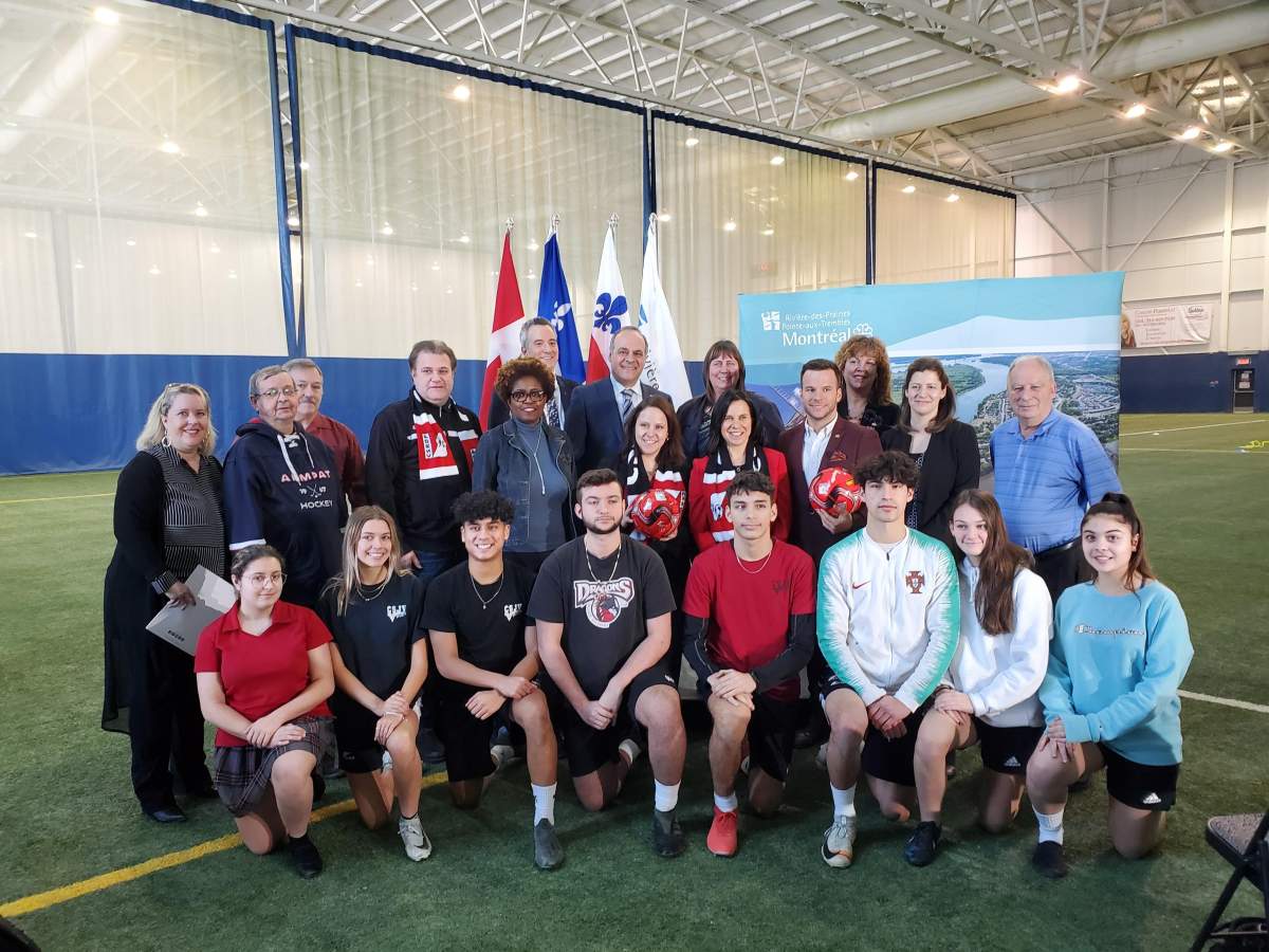 Sports team and coaches were there for the announcement.