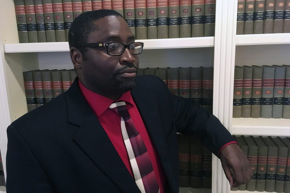 Sauntore Thomas poses in his attorneys office Thursday, Jan. 23, 2020 in Bloomfield Hills, Mich.