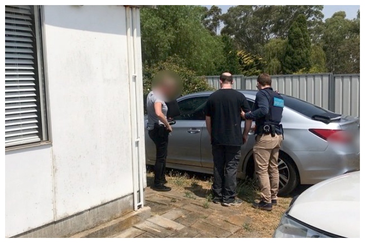 Police in South Australia are shown arresting a 30-year-old man suspected of possessing a child sex doll on Jan. 14, 2020.