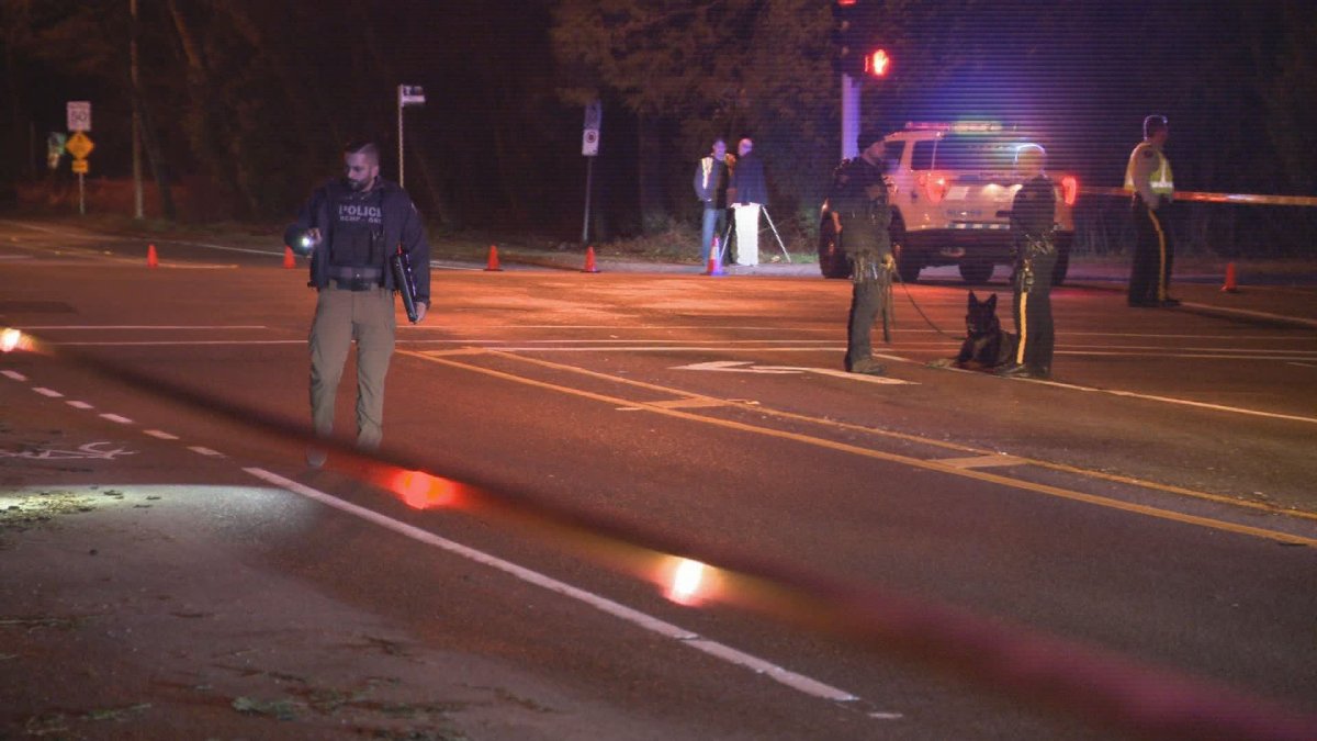 RCMP investigate a vehicle-to-vehicle shooting in Surrey on Thursday night. 