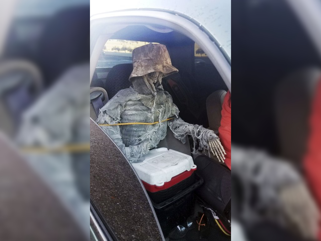This Thursday, Jan. 23, 2020, photo provided by the Arizona Department of Public Safety shows a dummy skeleton found after a State Trooper traffic stop of a 62-year-old man for an HOV lane violation in Phoenix.
