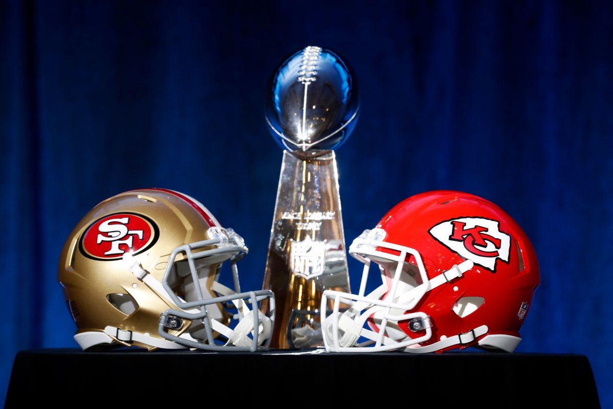 The Vince Lombardi trophy on display with the NFC Champions San Francisco 49ers helmet and the AFC Champions Kansas City helmet in Miami, Florida, on Jan. 29, 2020.