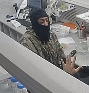 Edmonton police have released suspect photos from a series of pharmacy robberies in Edmonton.
