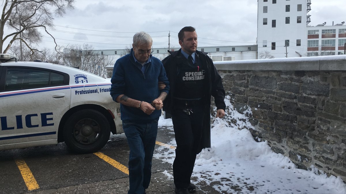 Terrence Finn is led to Peterborough Superior Court for his first-degree murder trial on Monday, Jan. 6.