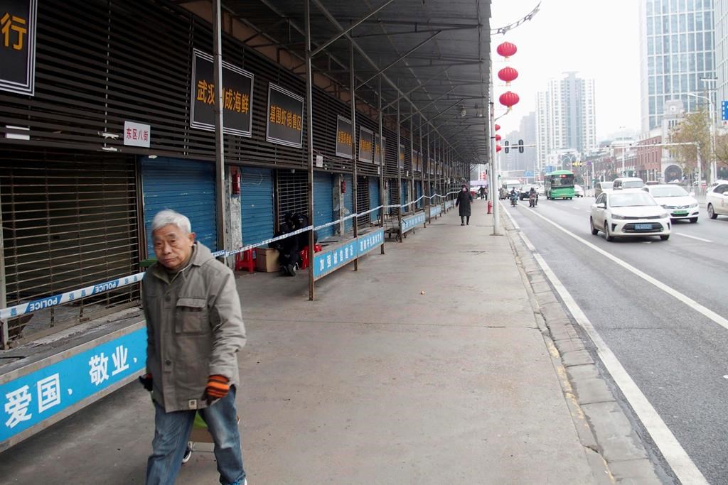 This Jan. 17, 2020, photo, shows the closed Huanan Seafood Wholesale Market in Wuhan, China. (Kyodo News via AP).