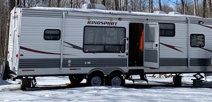 A camping trailer, an ATV and a utility trailer were reported stolen from a hunting camp in Peterborough County .