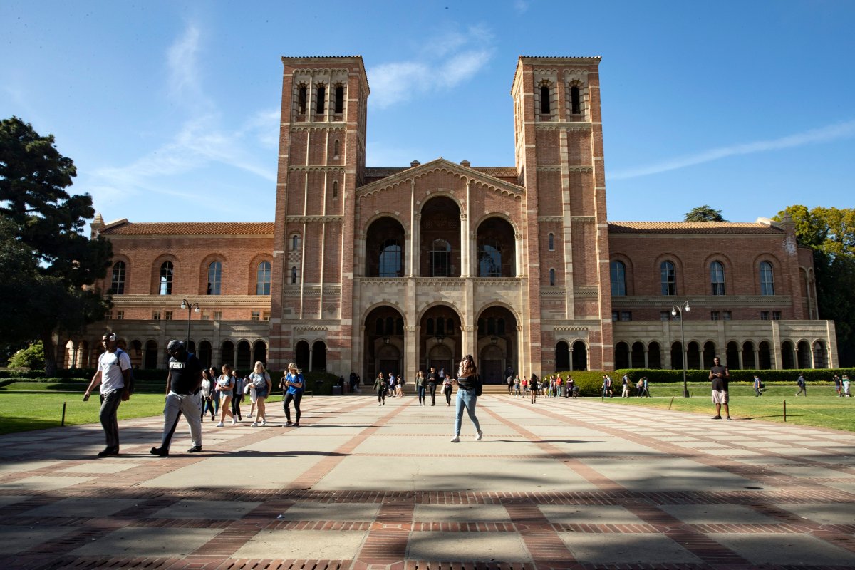 Students walk past a hall at the University of California Los Angeles (UCLA) campus in Los Angeles, California, USA, 25 April 2018. 