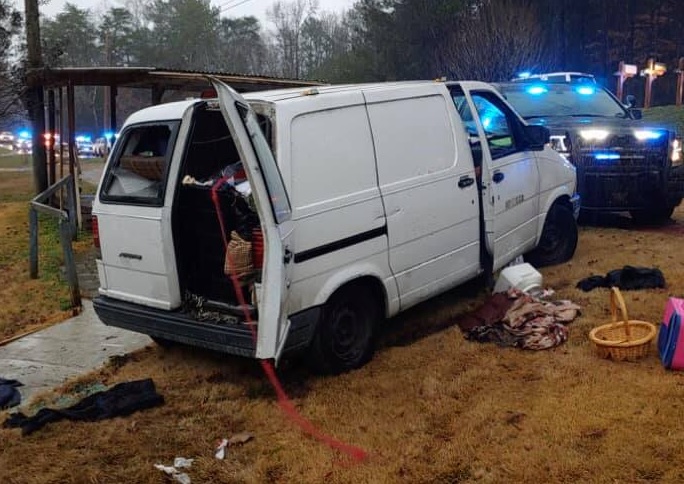 The van where police say a woman was held at knifepoint after being kidnapped in Alabama.