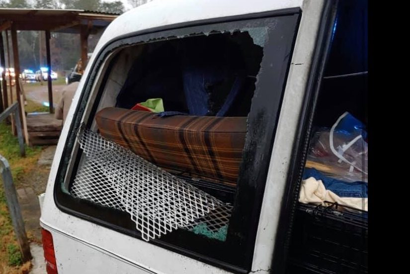 Police said wire and blankets were covering the rear windows of the van.