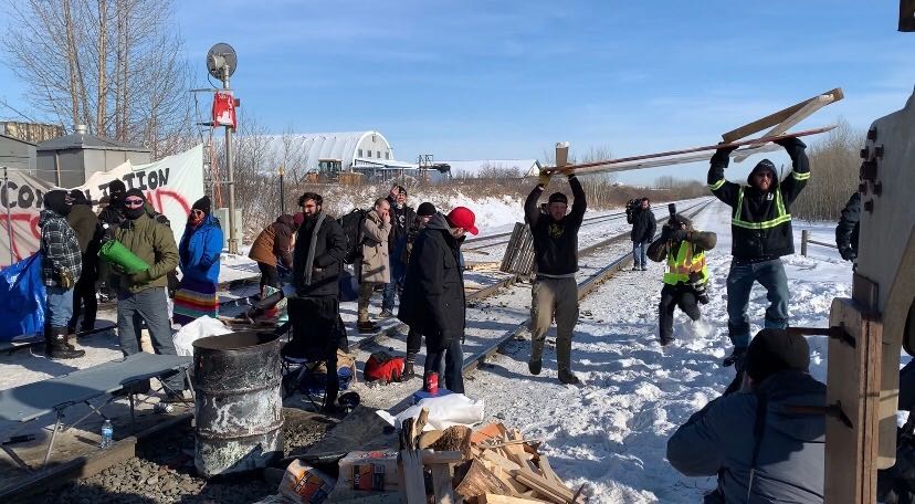 Tensions rise at a rail blockade on the outskirts of Edmonton on Wednesday, Feb. 19, 2020.