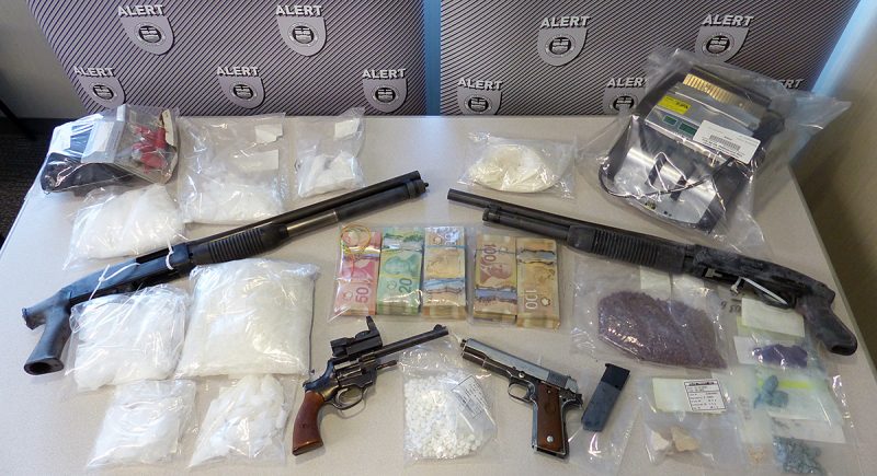 Drugs and firearms were seized from two Calgary homes searched on Jan. 23, 2020, police said. 