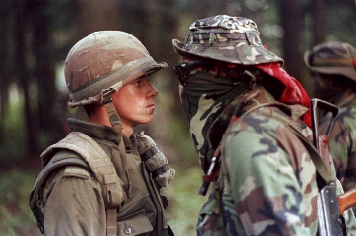 Canadian soldier Patrick Cloutier and Brad Laroque alias "Freddy Kruger" come face to face in a tense standoff at the Kahnesatake reserve in Oka, Que., Sept. 1, 1990. 