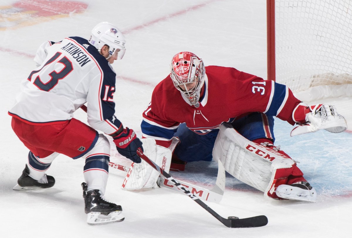 Montreal Canadiens goaltender Carey Price makes a save against Columbus Blue Jackets' Cam Atkinson in this file photo. 