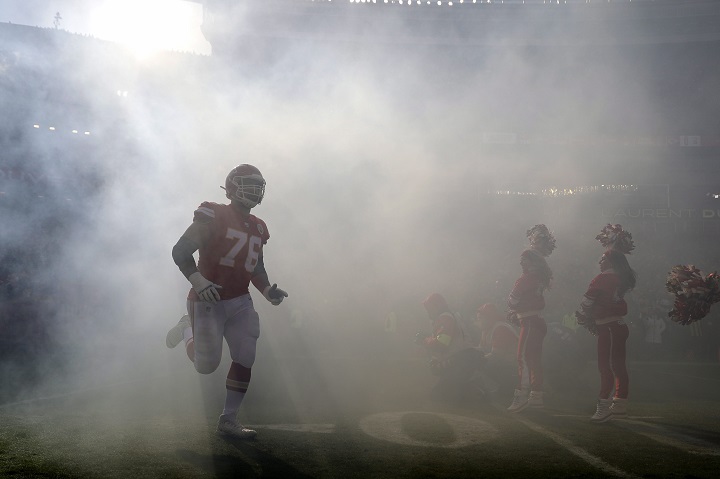 Kansas City Chiefs' Laurent Duvernay-Tardif (76) is introduced before the NFL AFC Championship football game against the Kansas City Chiefs Sunday, Jan. 19, 2020, in Kansas City, MO. 