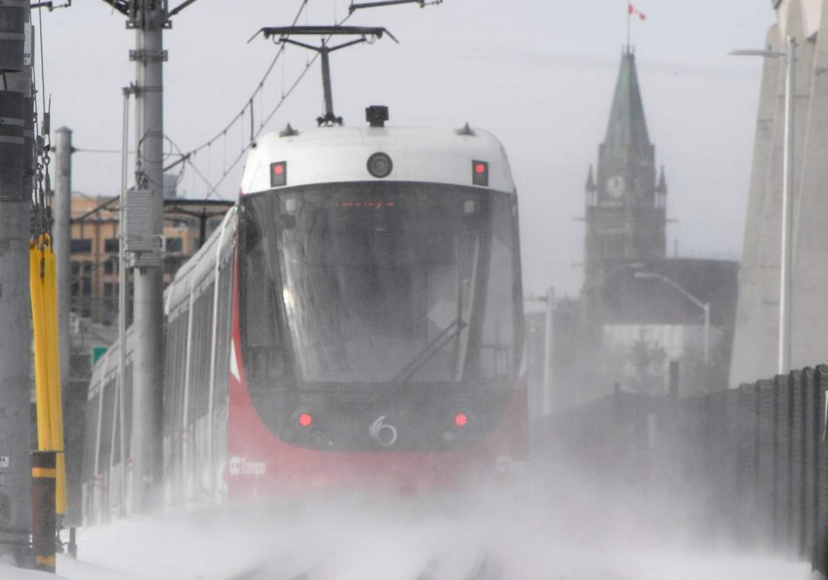 An OC Transpo light-rail train is seen heading towards downtown Ottawa on Tuesday, Jan. 21, 2020.