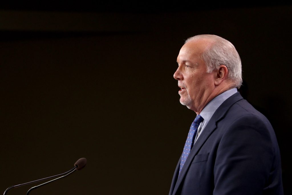 Premier John Horgan holds his first press conference of the year as he comments on various questions from the media in the Press Gallery at B.C. Legislature in Victoria, B.C., on Monday, January 13, 2020. B.C.'s New Democrat government will be pointing out its achievements on affordability and economic fronts while introducing a political agenda for the next year as the October 2021 election approaches, Horgan says.