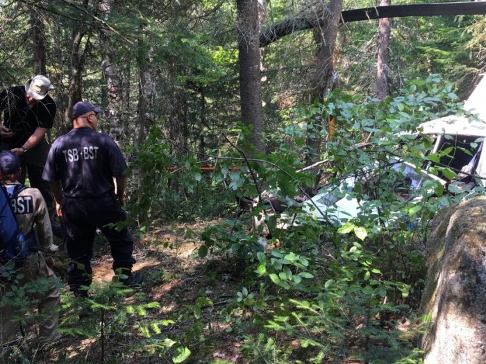 The wreckage of a Robinson R44 helicopter is shown in near Lac Valtrie, Que., in this July 2019 handout photo.