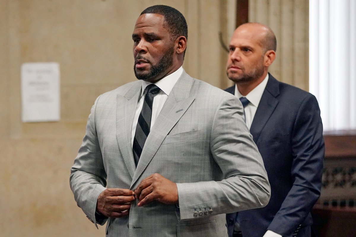 FILE - In this June 6, 2019, file photo, singer R. Kelly pleaded not guilty to 11 additional sex-related felonies during a court hearing before Judge Lawrence Flood at Leighton Criminal Court Building in Chicago. 