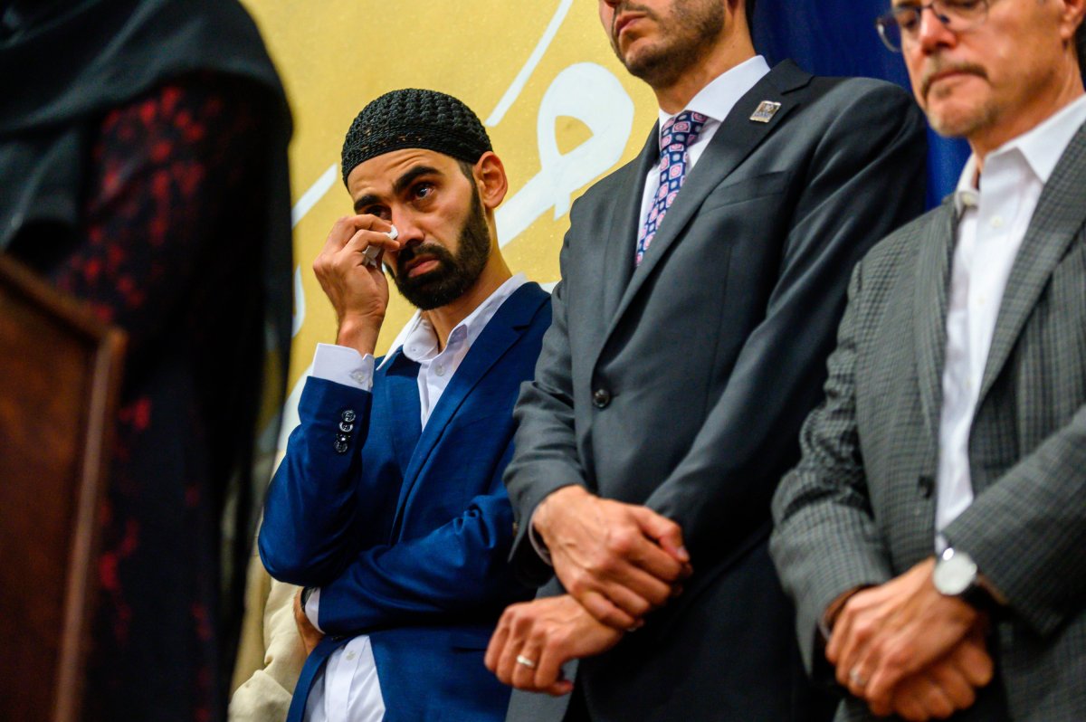 In this Aug. 11, 2019, file photo, Hamid Hayat wipes tears as he stands with his legal team, and family members during a news conference Sunday that coincided with an Eid al-Adha celebration, in Sacramento, Calif. 