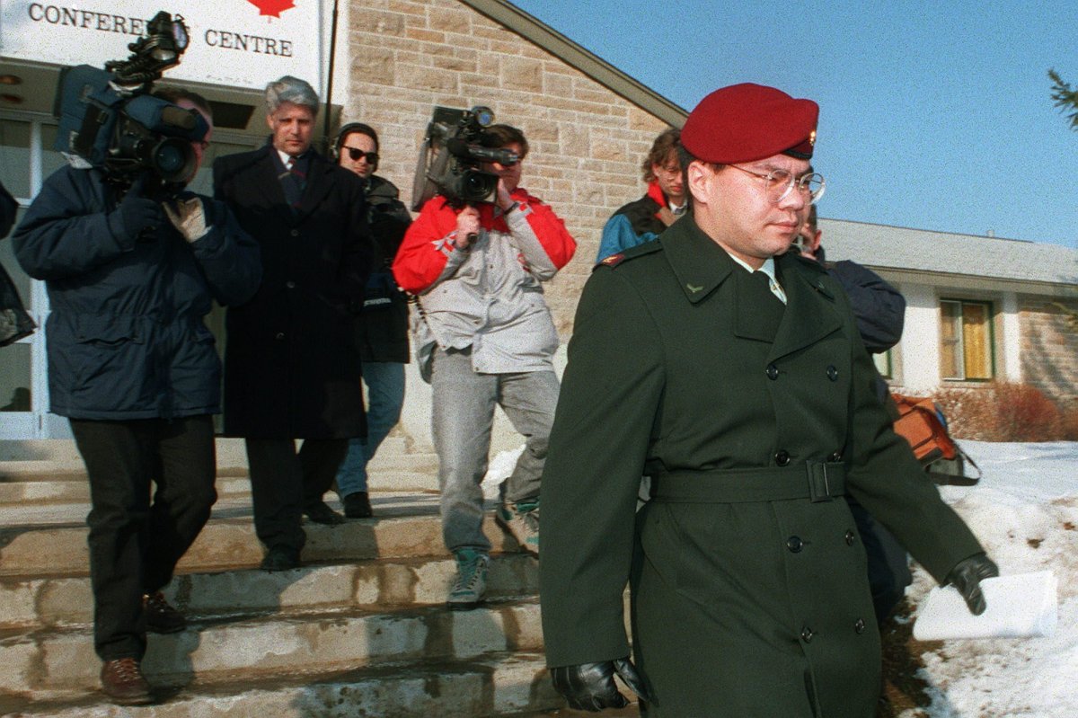 Pte. Elvin Kyle Brown is followed out of the courthouse at Canadian Forces Base Petawawa March 17, 1994 after court adjourned for the day. The session would decide Brown's fate for his role in the death of a Somali teenager.